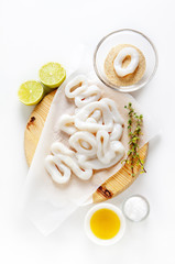 sliced raw squid rings with lime, olive oil, breadcrumbs. Prepar