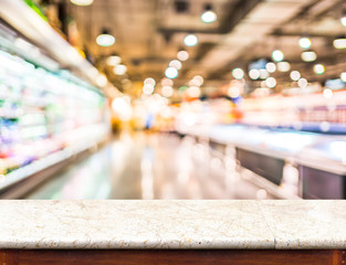 Leinwandbilder - Empty marble table top and blurred supermarket bokeh light in ba