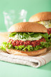 vegan beet and quinoa burger with avocado dressing
