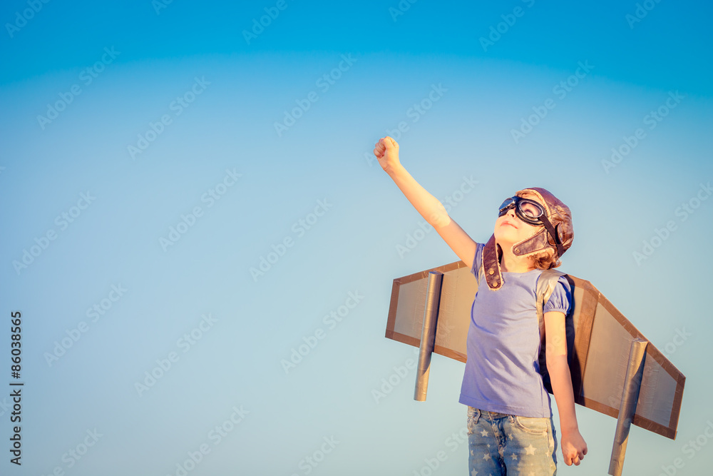 Happy child playing outdoors - obrazy, fototapety, plakaty 