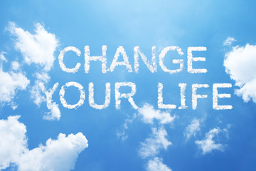 change your life clouds word on sky.