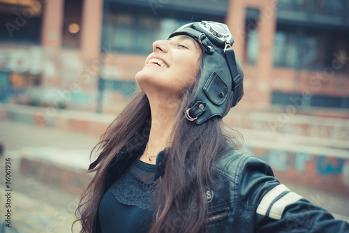 Fotografia, Obraz aviator young beautiful brunette woman with cap and glasses