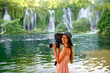 Woman tourist near Kravica waterfall