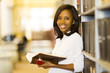 © michaeljung - female african american student in university library
