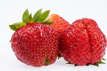 Wall Mural - some fruits of strawberry isolated on white background