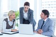 © WavebreakmediaMicro - Business people using laptop