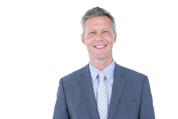  Smiling businessman against a white background