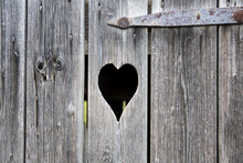 Old Wooden Door With A Carved Heart