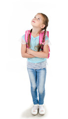 Portrait of smiling schoolgirl looking up