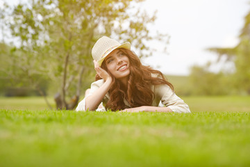 Wall Mural - Beautiful Young Woman Outdoors. Enjoy Nature. Healthy Smiling Gi