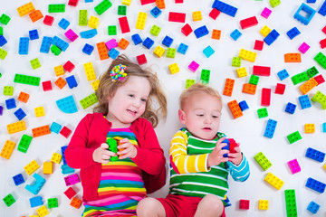 Wall Mural - Kids playing with colorful blocks