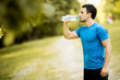 © BGStock72 - Young man drinking water