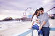 © Joshua Resnick - romantic couple taking selfie in front of santa monica pier