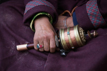 Old Tibetan Woman Holding Buddhist Prayer Wheel, Ladakh, India