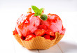 Ice cream with strawberries in wafer bowl