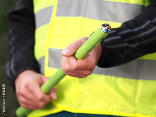 Fotografie, Obraz Green Nylon jacketed 576 fiber optic ribbon cable end used for the National Broa