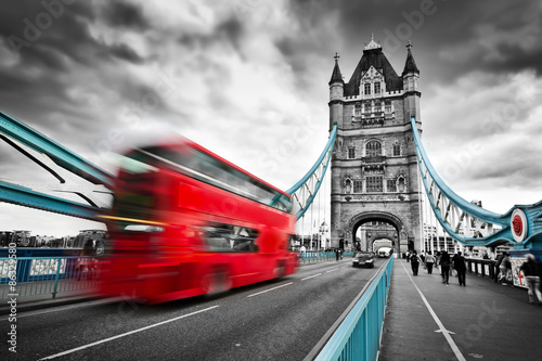 red-bus-in-motion-on-tower-bridge-in-london-the-uk