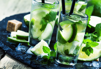 Traditional Brazilian caipirinha alcoholic cocktail with lime, m