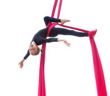 Fototapeta  - cheerful child training on aerial silks