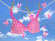 © driftwood - breast cancer awareness pink ribbons as butterflies with pink bra