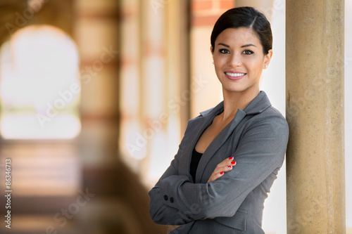 Fotografie, Obraz Beautiful young adult lawyer business woman professional in a suit at the courth