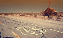 Route 66 Pavement Sign Sunrise In California's Mojave Desert.