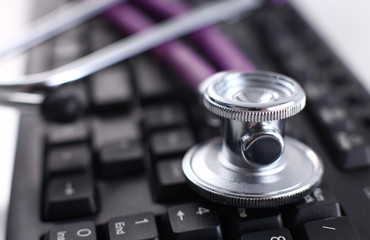 Stethoscope on laptop keyboard. Concept 3D image