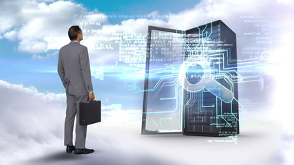 Wall Mural - Businessman looking at server tower on cloudy sky background 