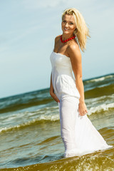 Canvas Print - Beautiful blonde girl on beach, summertime