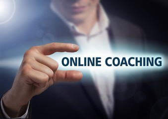 Businessman presses button online coaching on virtual screens. B