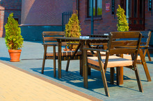 Outdoor Cafes On The Embankment Of Fishing Village In Kaliningrad In The Summer