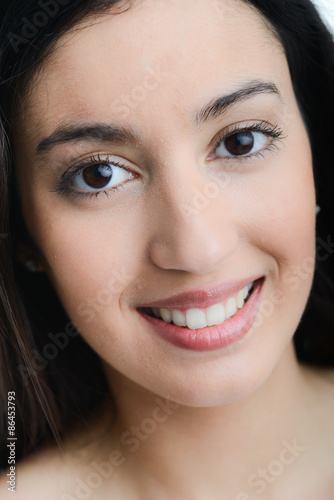 Face Close Up Of A Beautiful Young Ethnic Woman With Black Eyes Face Close Up Of A Beautiful Young Ethnic Woman With Black Eyes