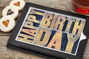 Wall Mural - happy birthday on tablet with tea and cookies