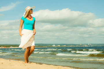 Canvas Print - Beautiful blonde girl on beach, summertime