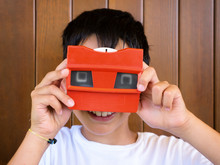 Little Boy Playing With Vintage 3d Viewer