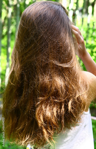 Teen Beautiful Girl With Long Brown Thick Hair On The Summer