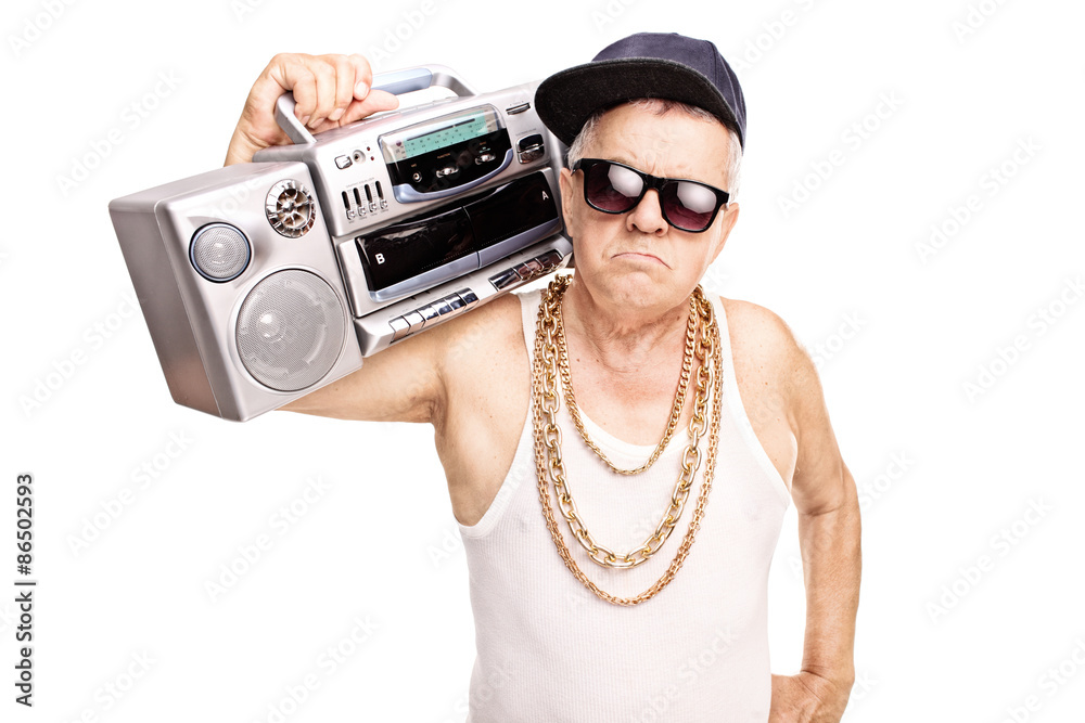Serious senior rapper holding a ghetto blaster - obrazy, fototapety, plakaty 