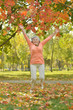 © aletia2011 - happy elderly woman in autumn park