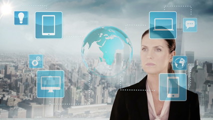 Fototapete - Businesswoman touching a futuristic interface 