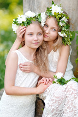 Wall Mural - Portrait of two little girls twins