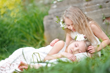 Sticker - Portrait of two little girls twins