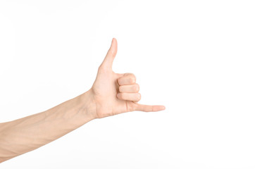 Wall Mural - Hand gestures theme: the human hand shows gestures isolated on white background in studio