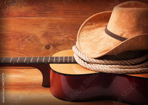 Dekoracja na wymiar  obraz-muzyki-country-z-gitara-i-kowbojskim-kapeluszem