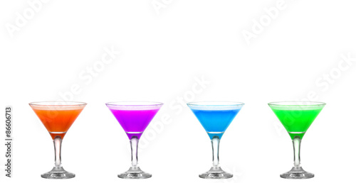 Obraz w ramie Four martini glasses with colored cocktails - hurray !!