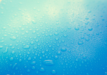  Drops of water on blue floor