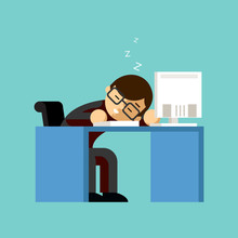 Businessman Sleeping On His Office Desk Top