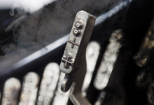 Add hammer - old manual typewriter - mystery smoke