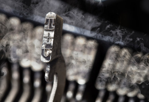 T hammer - old manual typewriter - mystery smoke