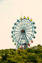 Amusement Park Ferris Wheel In The Sky