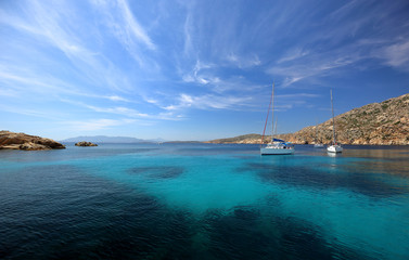 Sailboats in the bay of Cala Coticcio in Caprera island, Sardinia, Italy